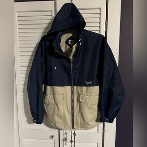 Vintage Reebok Men's Blue and Cream Hooded Windbreaker